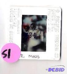 lot 51 image: 1999 Pacific Trading Card Company Randy Moss Slide used for trading card
