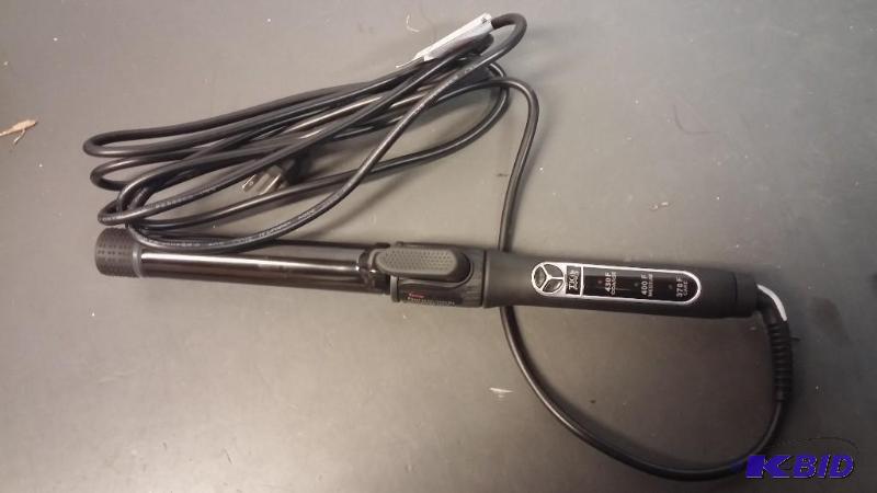lot 23 image: TIGI Professional Curling Iron...