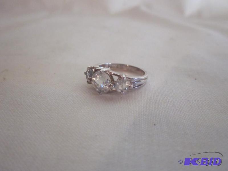 .925 marked Sterling Silver woman (3) stone p...