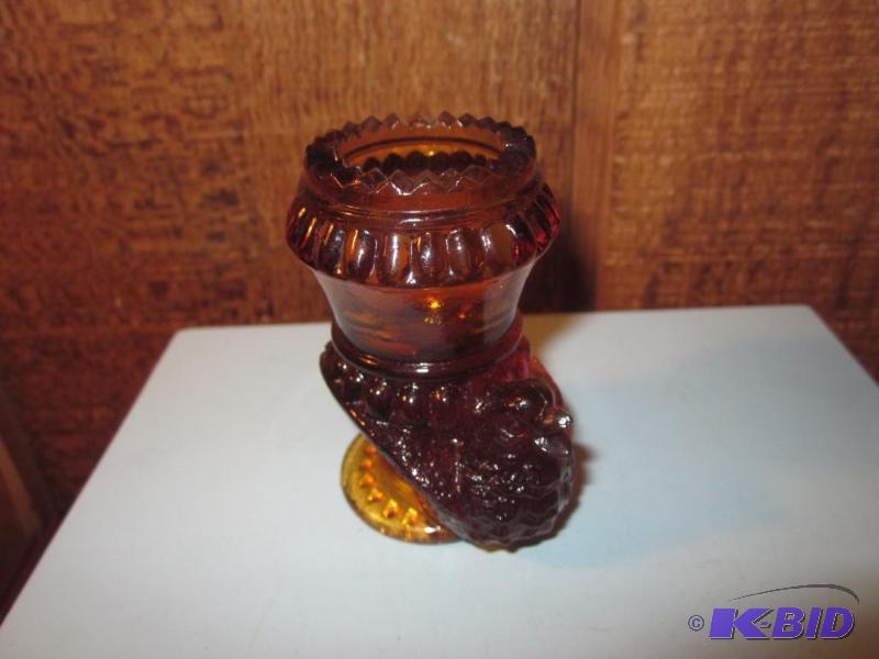 Small auburn color depression glass hen tooth...