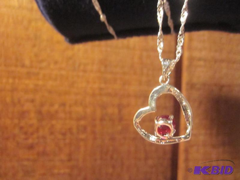 Sterling Silver heart with red stone necklace...