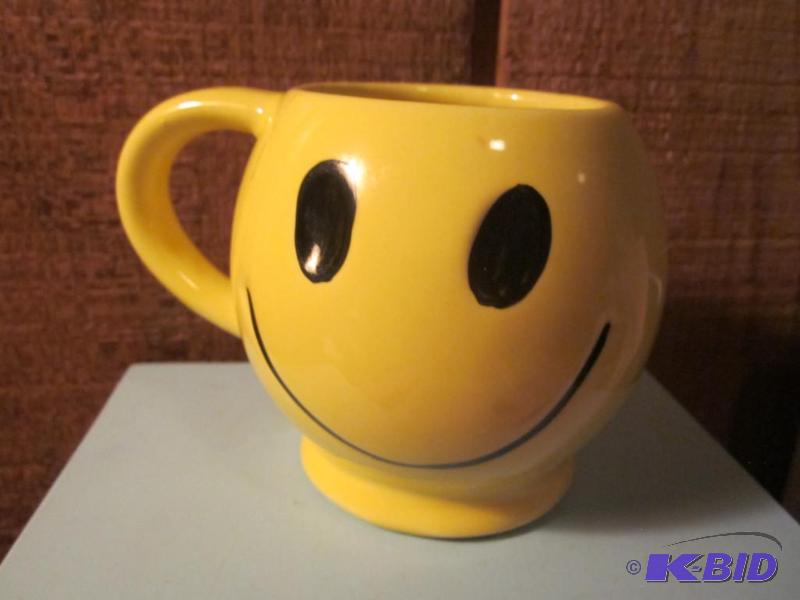 1970s McCoy Happy Mug, has damage that has b...