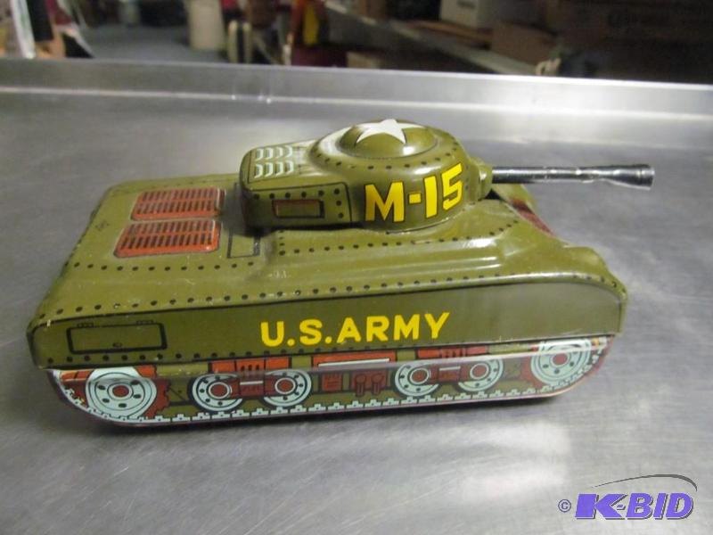 lot 56 image: Vintage tin US Army friction toy tank