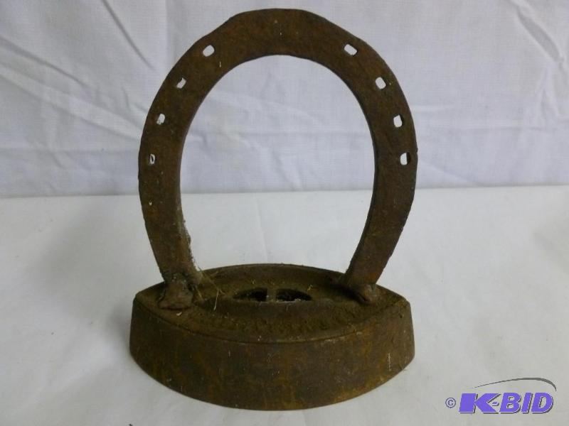 Sad Iron with Horse-Shoe Handle.