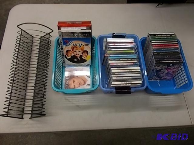 Approx. 40 CDs, 3 DVDs &amp CD Storage Rack...
