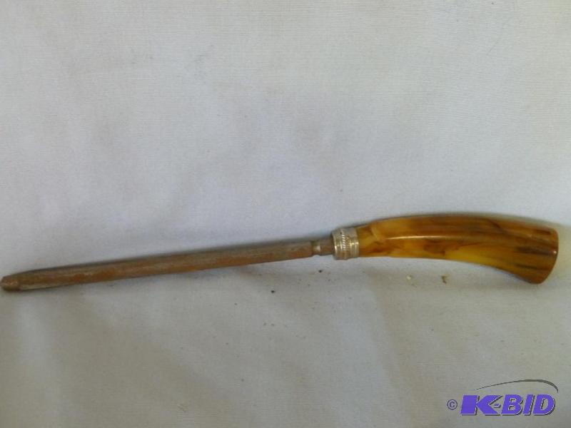 lot 106 image: Vintage Bakelite handled knife sharpening ste...