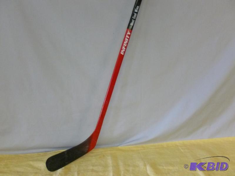 lot 130 image: Infinity Alpha right handed wooden youth hock...