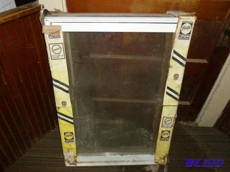 lot 5 image: Pella Pro Line wood encased crank out style d...