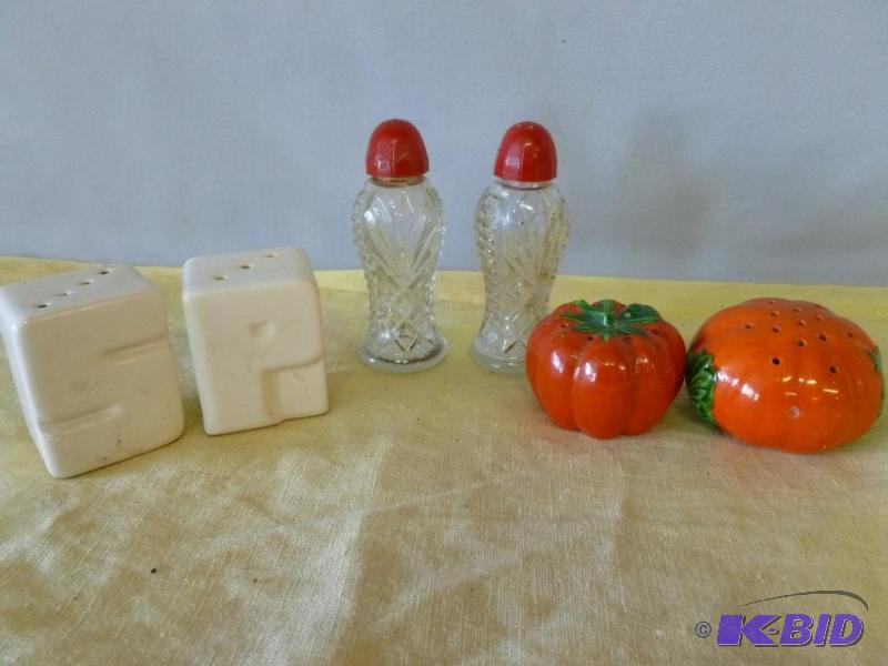 lot 59 image: Lot of three salt and pepper shaker sets....