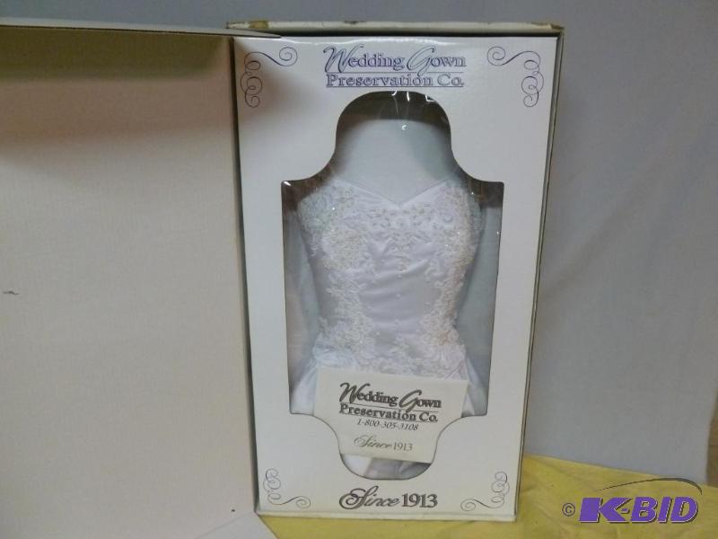 lot 8 image: Beautiful Wedding Dress, Comes Preserved In A...