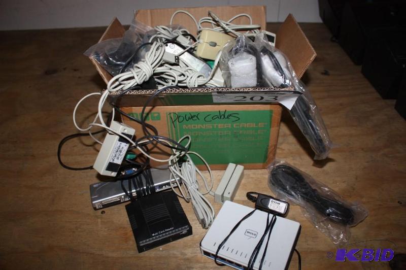 lot 203 image: Box Lot of Miscellaneous Electronics Including CC Reader Cables USB Cords Card Readers And More.