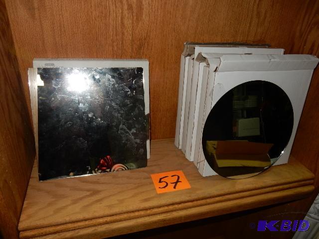 lot 57 image: 7, 12in x 12 in square mirrors.. 29, 12 in Ro...