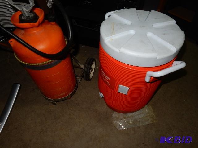 lot 91 image: 6 gal rubbermaid cooler.. Sprayer on wheels.