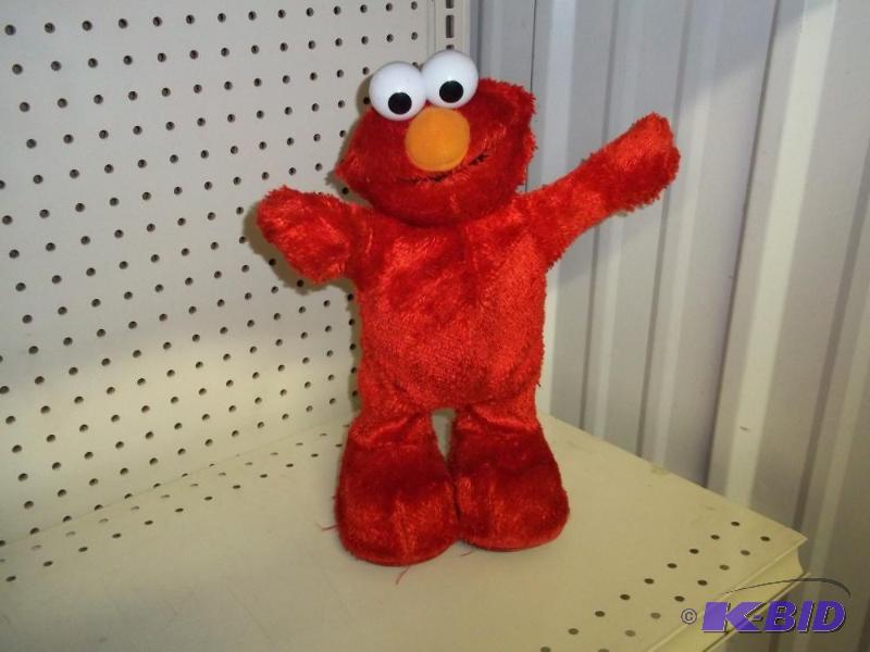 lot 50 image: Dancing Elmo...