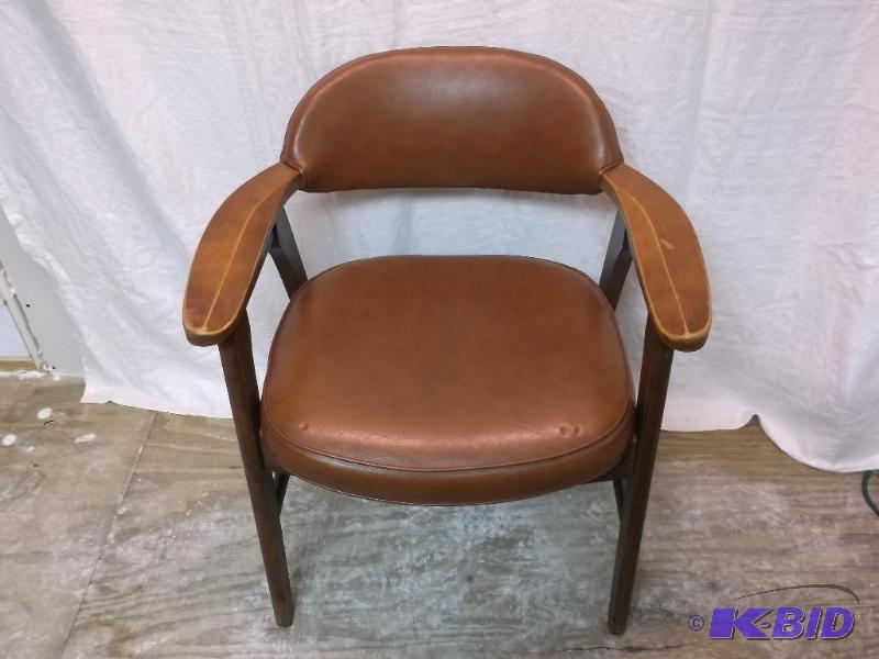 Leather like arm chair measuring 19 12&quot...