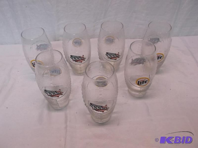 Nice lot with 7 Miller Lite football super bo...