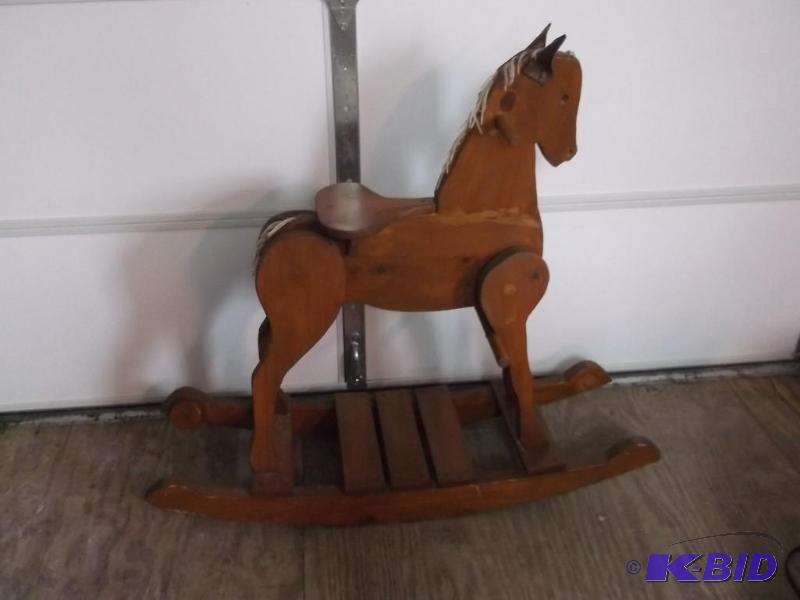 Nice solid wood child rocking horse measuring...