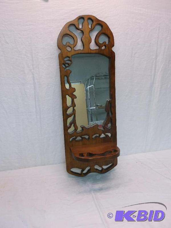 Solid wood framed mirror measuring 10 34&quo...