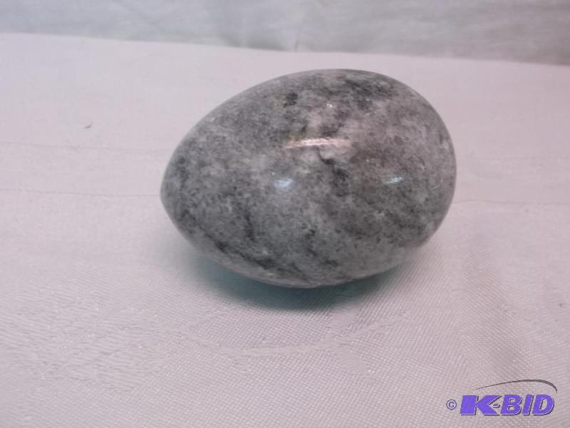 Large granite egg measuring 3&quot L x 2&quo...
