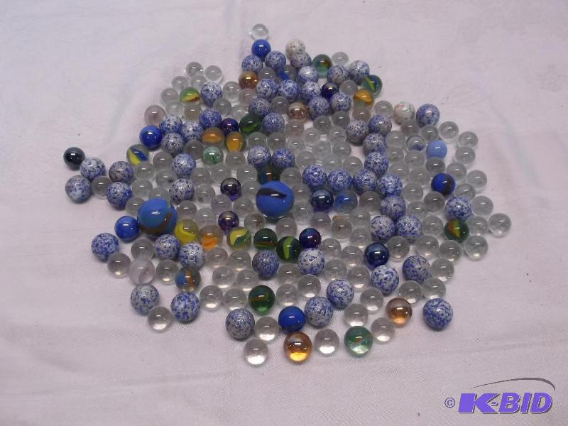 Large lot of marbles comes in plastic storage...