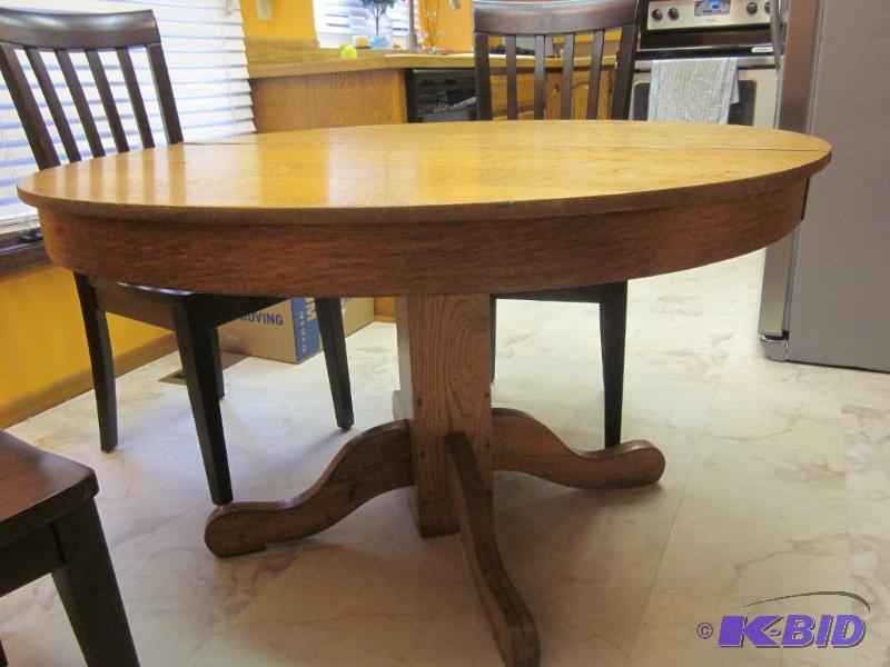 lot 142 image: 48 inch round cross cut tiger oak table, some...