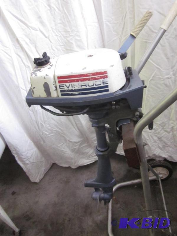 lot 15 image: Evinrude 2HP tiller boat motor, excellent run...