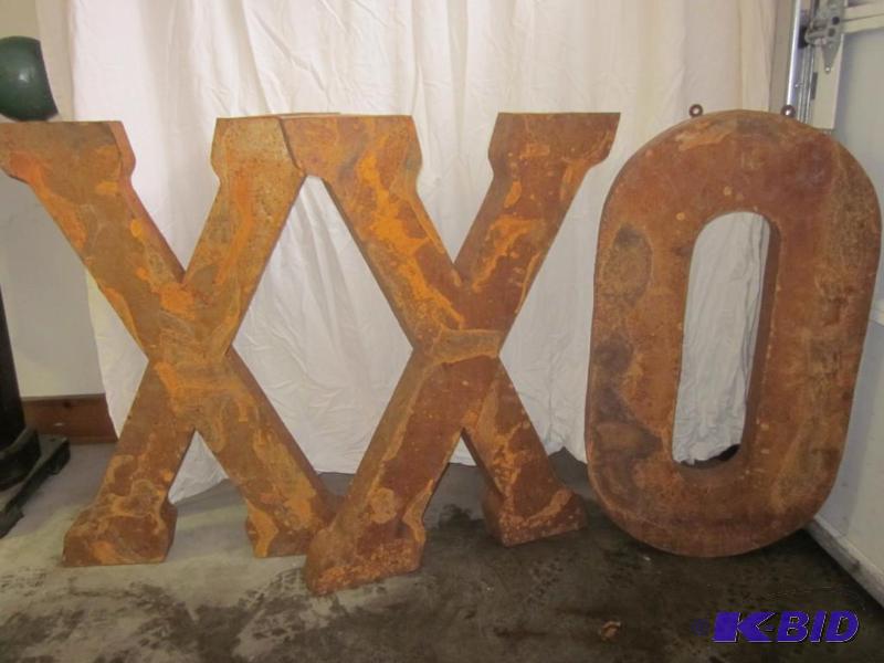 lot 2 image: Large weathered metal X O X, outdoor advertis...
