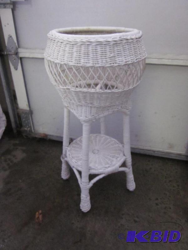 lot 23 image: Vintage white wicker plant stand.     &n...