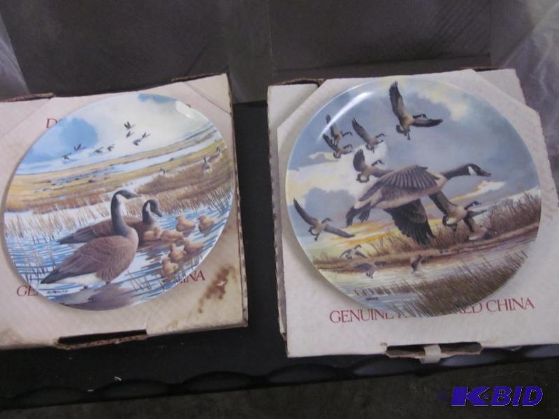 lot 28 image: Pair of decorative Canadian plates.     ...