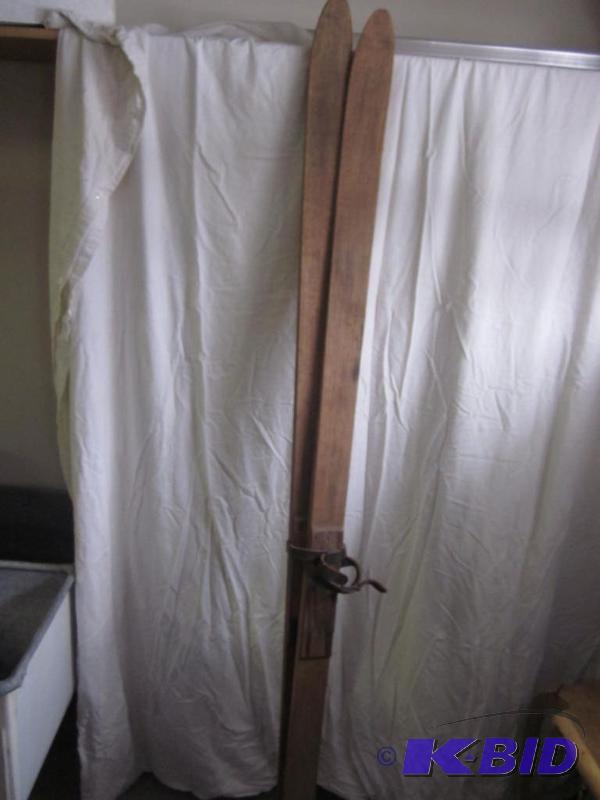 lot 31 image: Pair of Antique solid wood winter skis with ...
