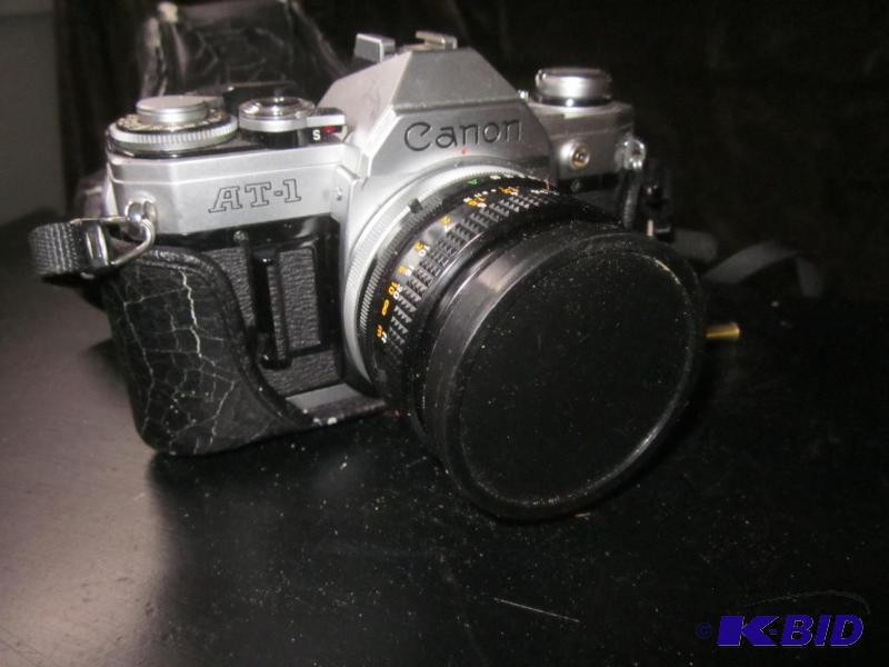 lot 41 image: Vintage Canon AT-1 35mm Camara      ...