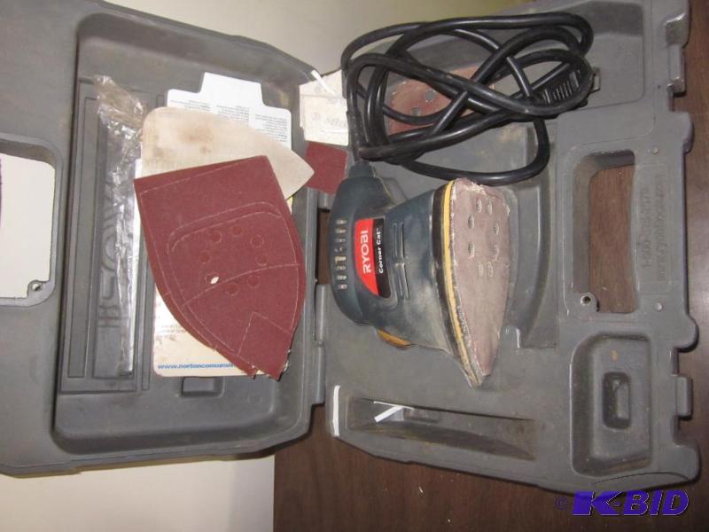 lot 53 image: Ryobi Cornercat electric palm sander in case....