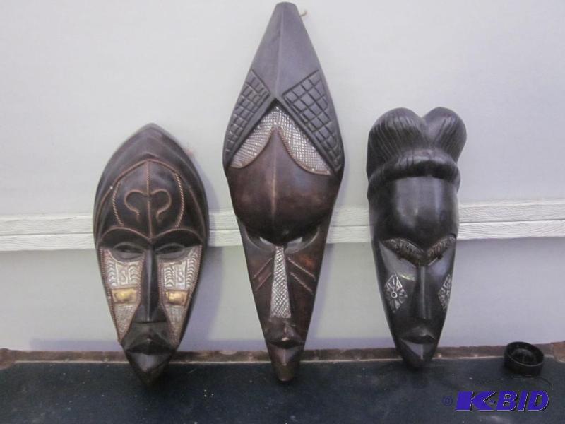 lot 69 image: Lot of (3) hand carved wood and metal tribal ...