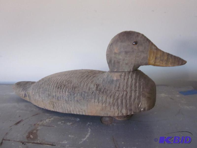 lot 84 image: Antique solid wood duck decoy with glass eyes...