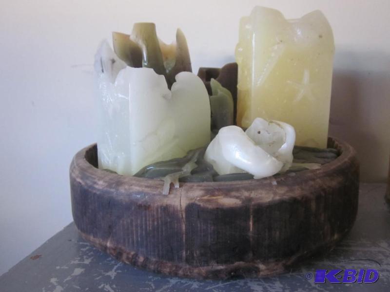 lot 87 image: Hand carved wood bowl filled with melted and ...