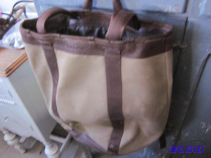 lot 97 image: Large canvas and leather LL Bean backpack bag...