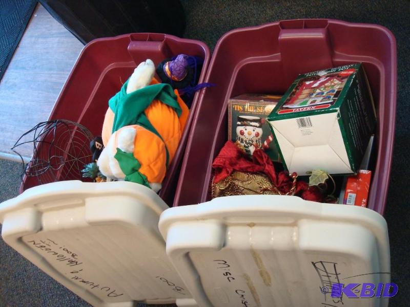 Two Bins With covers Filled With Holiday Item...