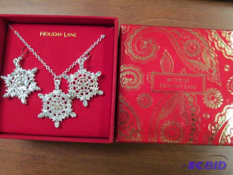 lot 38 image: Macys Holiday Lane snowflake necklace and ea...
