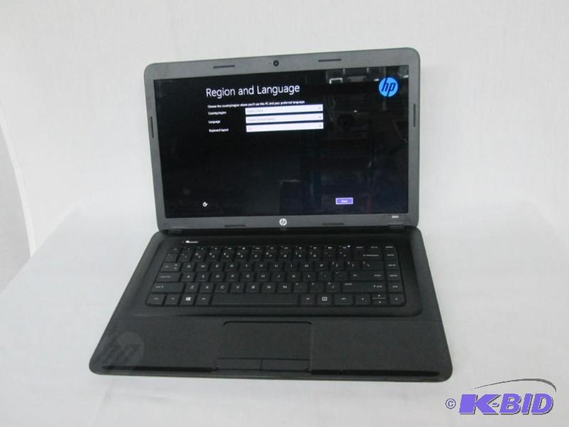 lot 2 image: HP 2000 15.6 4GB Windows 8 Laptop