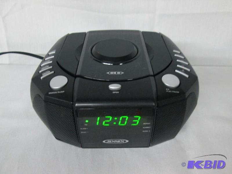 lot 33 image: Jensen Stereo Dual Alarm Clock Radio w CD Player