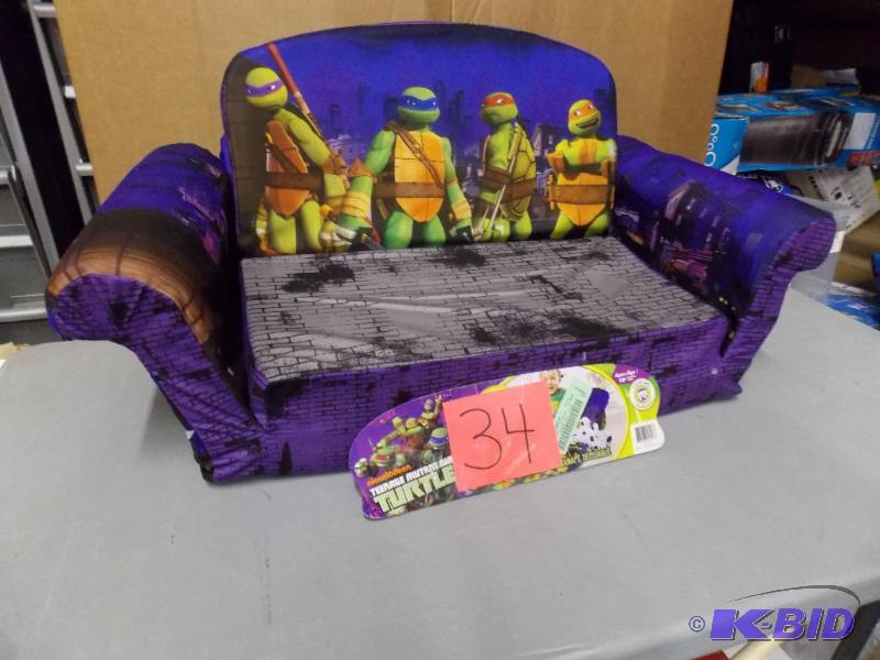 lot 34 image: Teenage Ninja Turtles Child Sofa - Small ripped