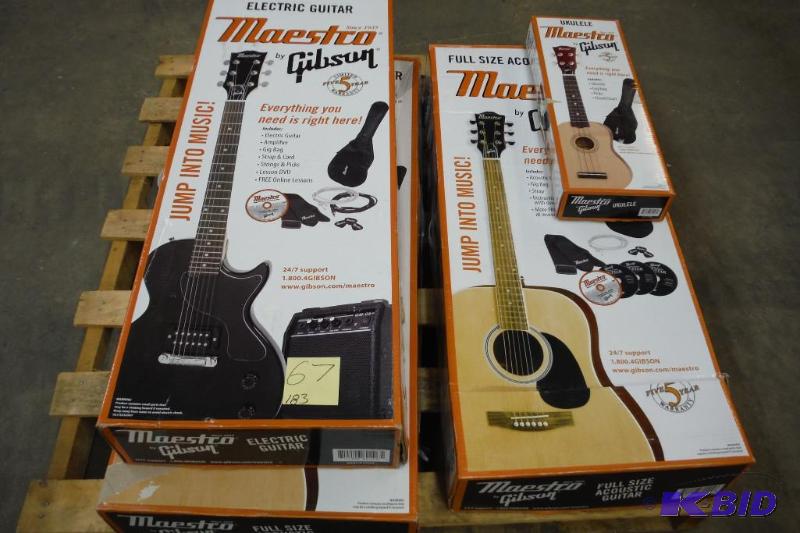 Lot of broken guitars and a ukulele