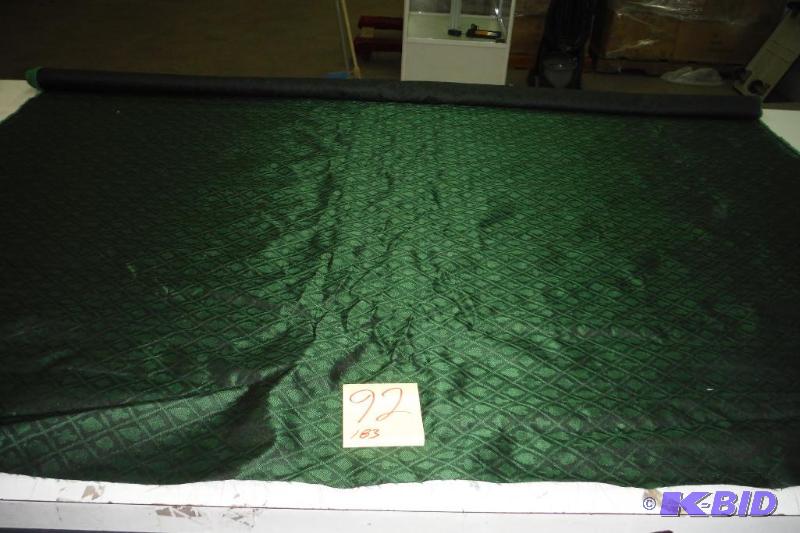 Roll of green fabric