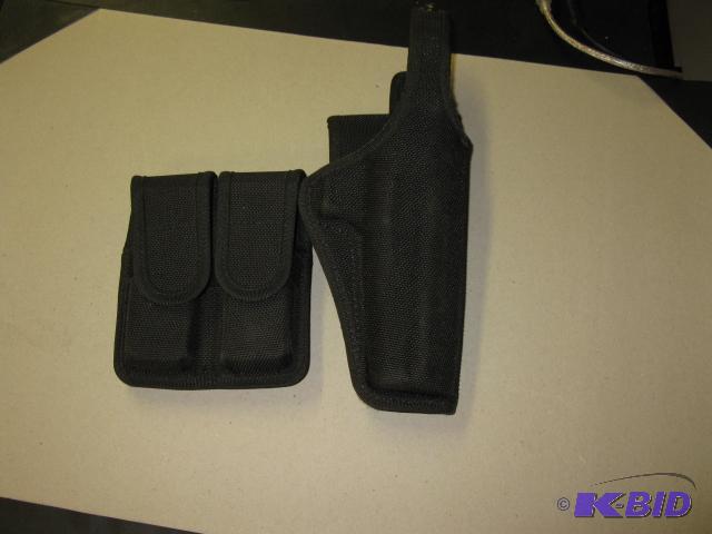 lot 25 image: Bianchi holster and magazine holder...