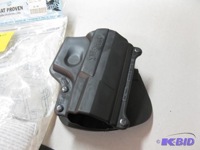 lot 28 image: Walther P99 paddle holster...