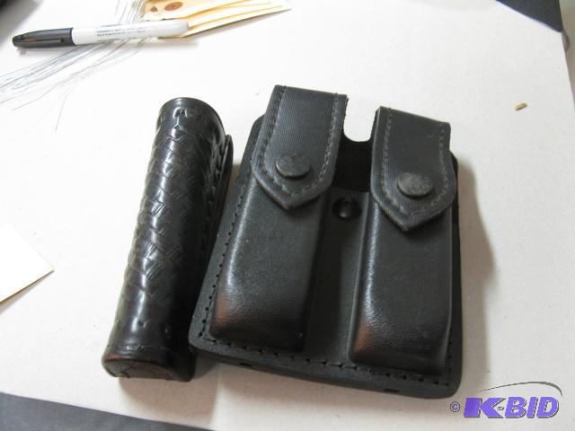 lot 35 image: Safariland model F-21 pepper spray holder and...