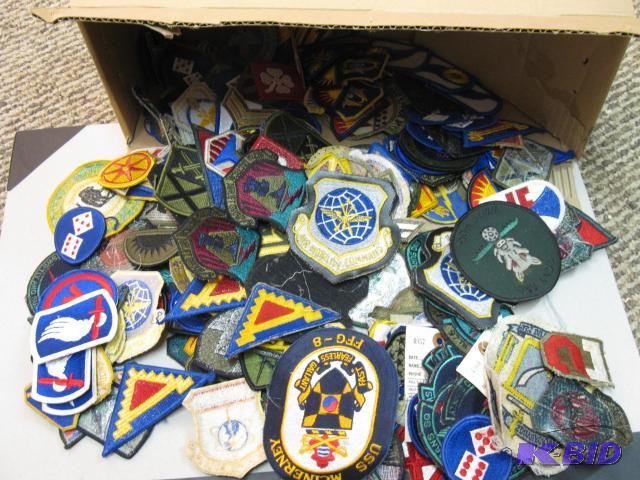 lot 40 image: Large box lot of Military patches...
