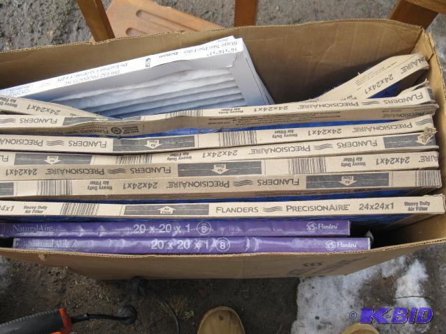 box of various sized furnace filters...