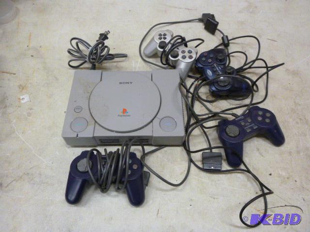 lot 133 image: PlayStation Four controllers....