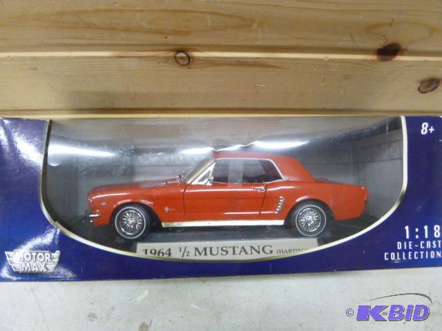 lot 22 image: 1964 12 Ford Mustang Motor Max die cast car,...